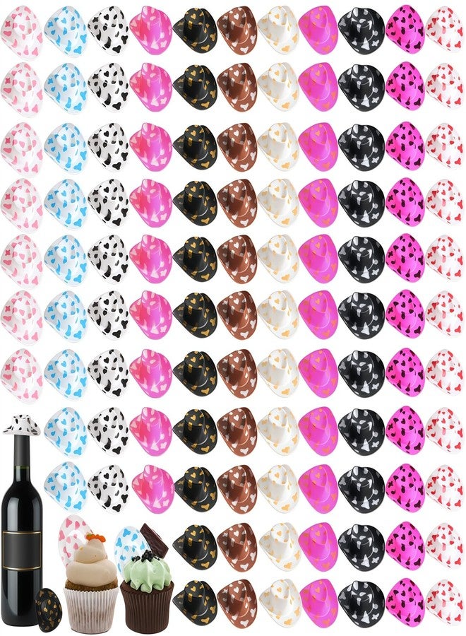 Cididu 110 Pcs Mini Cowboy Hats, Plastic Tiny Cowboy Hat for Party, 2 Inch Miniature Western Cowboy Cowgirl Hat for Crafts, Small Doll Hats for Pet Cake Cupcake Bottle Decor Outdoor Party, Cow Print - Image 1